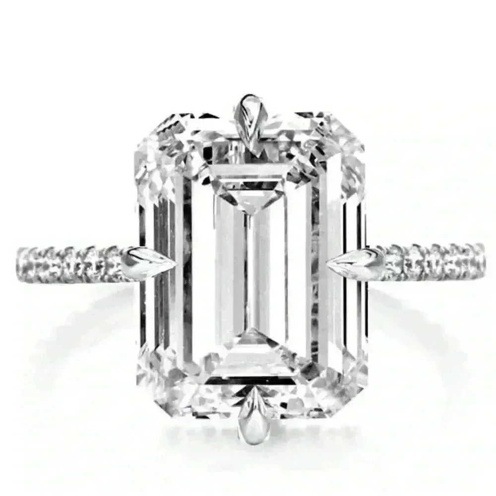 Italo Jewelry Hidden Halo Emerald Cut Engagement and pave band